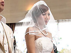 Asian hostess in super wet wedding dress